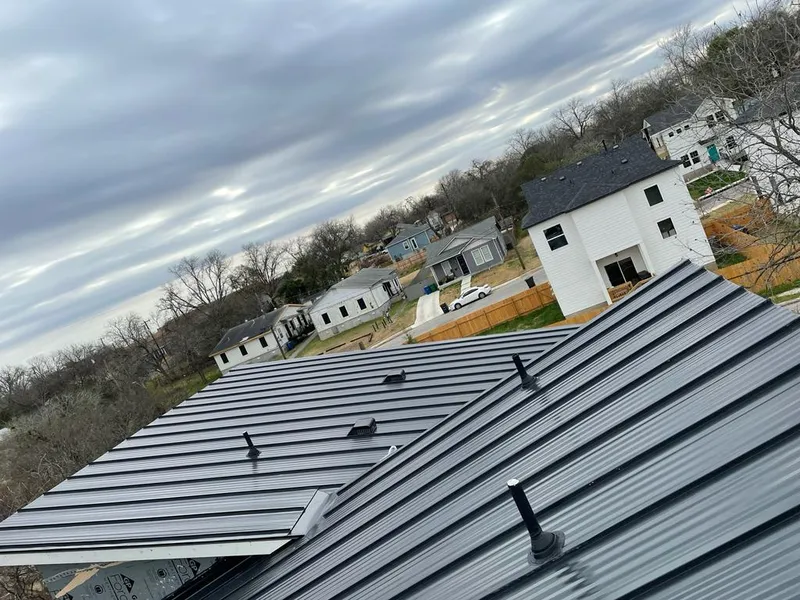 Standing seam metal roof panels with vents for Skylight Repair in Cadillac